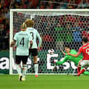 Hal Robson-Kanu of Wales scores his team's second goal against Belgium at Euro 2016.
