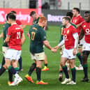 South Africa's and British and Irish Lions players shake hands after the first rugby union Test match at The Cape Town Stadium in Cape Town on July 24, 2021. (Photo by RODGER BOSCH / AFP) (Photo by RODGER BOSCH/AFP via Getty Images)