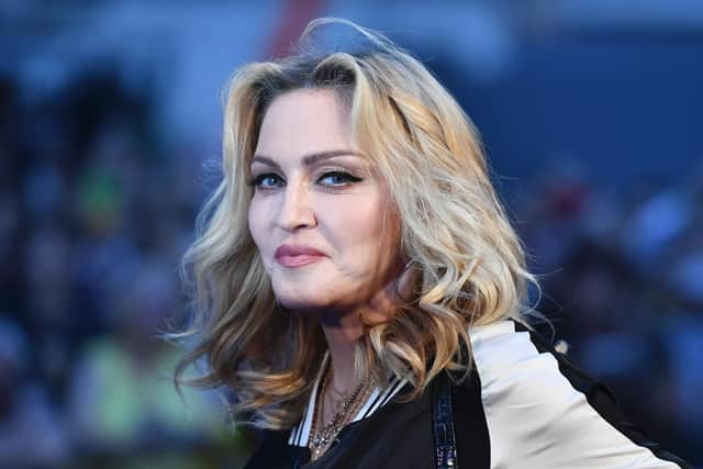 US singer-songwriter Madonna poses arriving on the carpet to attend a special screening of the film "The Beatles Eight Days A Week: The Touring Years" (BEN STANSALL/AFP via Getty Images)