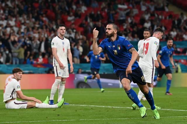 Leonardo Bonucci celebrates scoring during the UEFA EURO 2020 final football match between Italy and England (Photo by PAUL ELLIS/POOL/AFP via Getty Images)