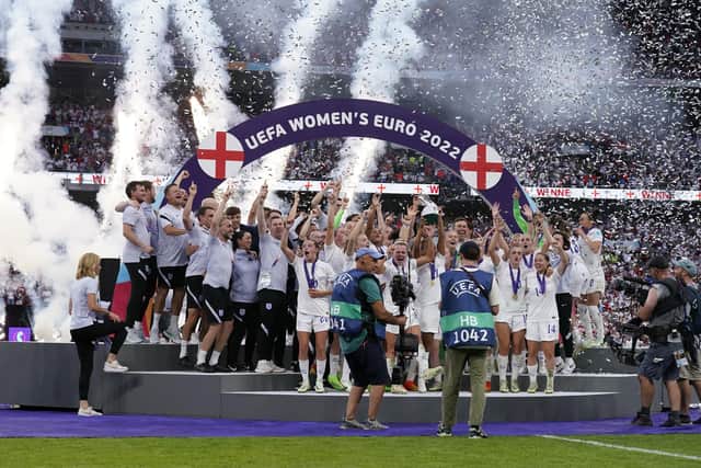England players celebrate with the trophy following victory over Germany in the UEFA Women's Euro 2022 final at Wembley Stadium, London. Picture date: Sunday July 31, 2022. PA Photo. See PA story SOCCER Euro 2022. Photo credit should read: Danny Lawson/PA Wire.