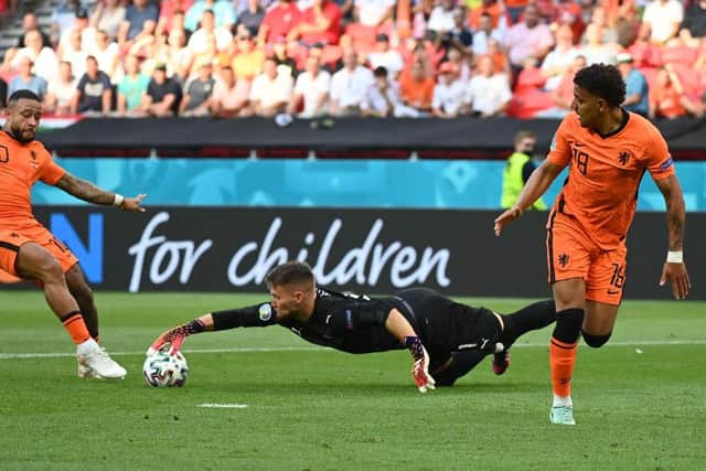 Netherlands' forward Donyell Malen (is denied by the brilliant Czech Republic goalkeeper Tomas Vaclik in what turned out to be a crucial part of the game.