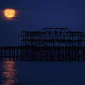 A supermoon rising over the West Pier on May 07, 2020 in Brighton.