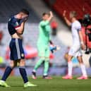 Scotland captain Andy Robertson of Scotland looks dejected following defeat in the UEFA Euro 2020 Championship Group D match.