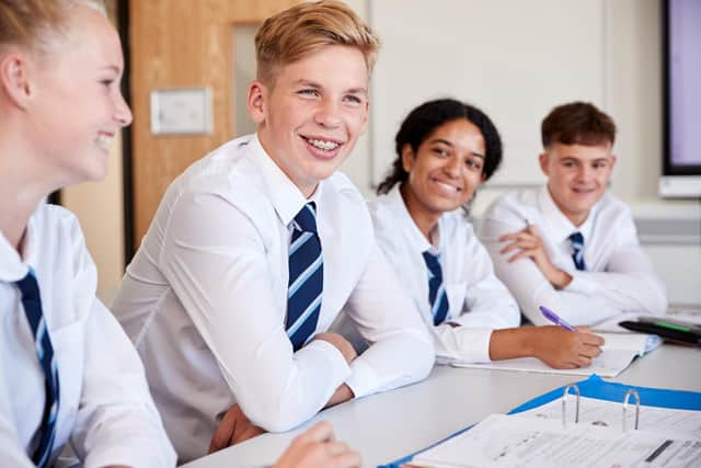 Parents and guardians of school kids can access a support grant up to £150 to help pay towards uniform costs, if they are struggling financially. (Pic: Shutterstock)