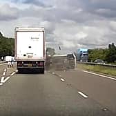 The video shows the driver swerving before crashing into the side of the lorry