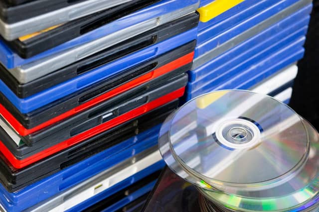 A stack of CD's and DVD's