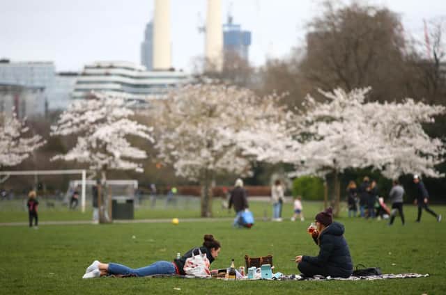 Two households with up to six people can now meet outdoors, as lockdown restrictions are relaxed in England (Photo by Hollie Adams/Getty Images)