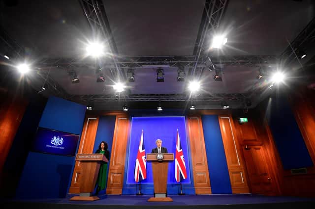 Britain's Prime Minister Boris Johnson holds a news conference in the new £2.6m studio. (Photo by Toby Melville - WPA Pool / Getty Images)