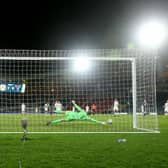 Che Adams of Scotland scores their team's third goal during the FIFA World Cup 2022 Qatar qualifying match between Scotland and Faroe Islands at Hampden Park on March 31, 2021 in Glasgow, Scotland.