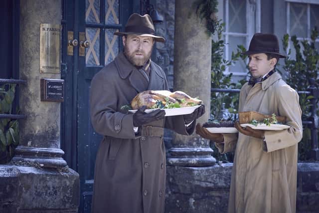 Samuel West as Siegfried Farnon and James Anthony-Rose as Richard Carmody in the Christmas episode of All Creatures Great and Small.