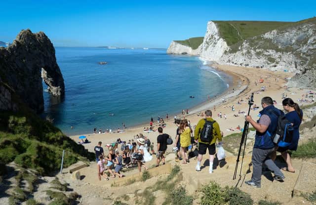 Woman pronounced dead at the scene after falling from cliff above popular beach in Dorset (Photo by Finnbarr Webster/Getty Images)