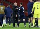 Steve Clarke shakes hands with captain Andy Robertson after his team's victory during the UEFA EURO 2020 play-off semi-final against Israel.