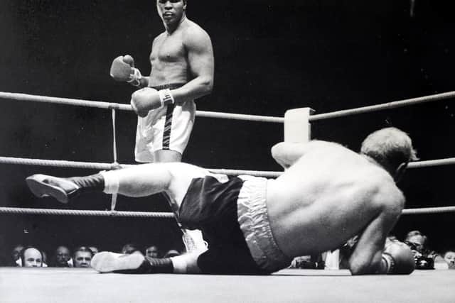 Muhammad Ali knocks out Richard Dunn in 1976. Picture by John Varley.
