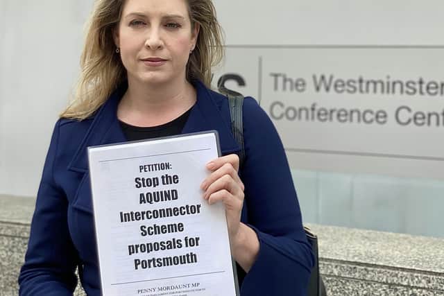 Penny Mordaunt hands in a petition against Aquind to the Department for Business, Energy & Industrial Strategy on Thursday, June 10 2021.
