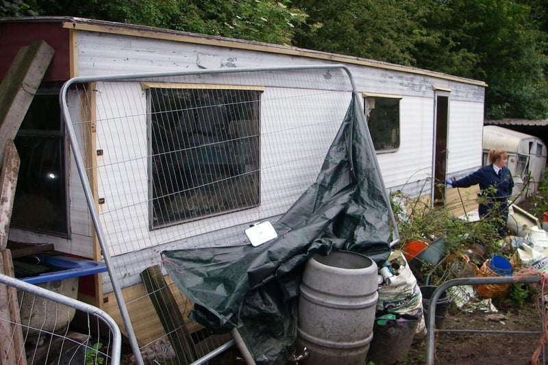 Some of the cats were kept in this old static caravan - with tarpaulin covering the windows with very little natural light or ventilation