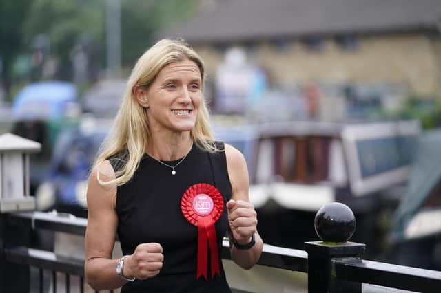 Kim Leadbeater celebrates by a canal in Huddersfield after winning the Batley and Spen by-election. Photo: Danny Lawson/PA Wire
