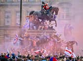 Rangers fans celebrate winning the Scottish Premiership title at George Square, Glasgow, on May 15, 2021.