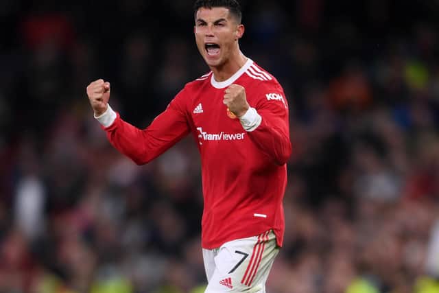 Cristiano Ronaldo celebrates victory on the final whistle after scoring a stoppage time winner during the UEFA Champions League group F match between Manchester United and Villarreal CF at Old Trafford. (Photo by Laurence Griffiths/Getty Images)