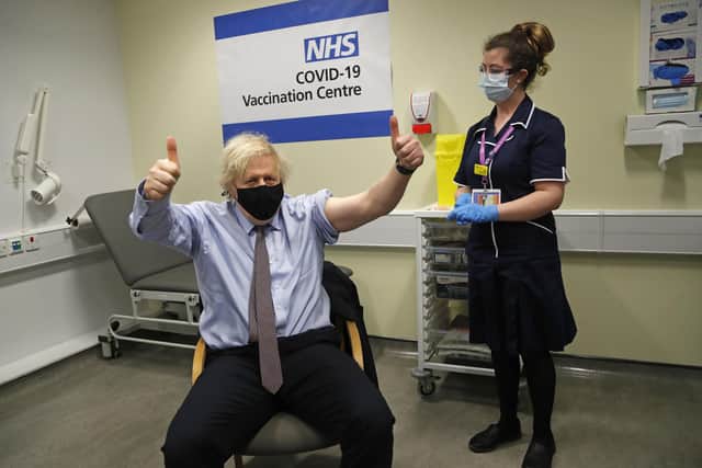 Prime Minister Boris Johnson gives thumbs up after receiving the first dose of AstraZeneca vaccine at Westminster Bridge Vaccination Centre in London (Photo: Frank Augstein/PA Wire/PA Images)