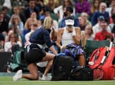 Following the conclusion of the third game of the second set of Emma Raducanu's fourth round match with Ajla Tomljanovic, the young Brit sought medical attention on court. (Pic: Getty)