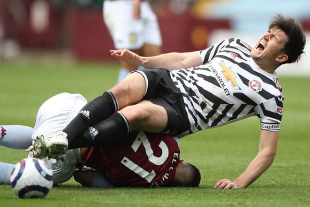 Manchester United defender Harry Maguire was injured in a tangle with Aston Villa's Dutch striker Anwar El Ghazi.