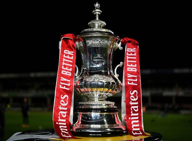 <p>A detailed view of the FA Cup Trophy (Photo by Dan Mullan/Getty Images)</p>