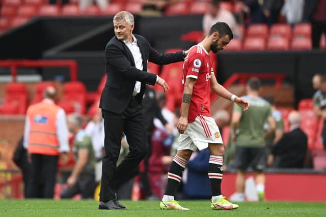 Ole Gunnar Solskjaer, Manager of Manchester United with Bruno Fernandes. (Photo by Gareth Copley/Getty Images)