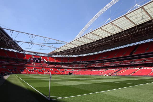 Wembley has a partially retractable roof that can be used to allow more sunlight onto the playing surface to help preserve and maintain the condition of the pitch. (Pic: Getty)