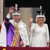King Charles III and Queen Camilla on the balcony of Buckingham Palace following the coronation on May 6.  Picture: Owen Humphreys/PA Wire