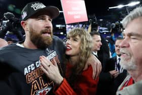 Travis Kelce of the Kansas City Chiefs celebrates with Taylor Swift after a 17-10 victory against the Baltimore Ravens in the AFC Championship game at M&T Bank Stadium, Maryland. (Photo by Patrick Smith/Getty Images)