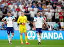 England's John Stones, goalkeeper Jordan Pickford and Declan Rice during the FIFA World Cup Quarter-Final match at the Al Bayt Stadium in Al Khor, Qatar. Picture: Nick Potts/PA Wire.