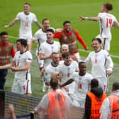 Raheem Sterling of England celebrates with teammates. (Photo by Matthew Childs - Pool/Getty Images)