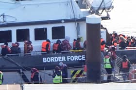 The number of migrants sent to France after reaching England by small boat is 75.