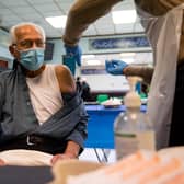 A man receiving an injection of the Oxford/AstraZeneca coronavirus vaccine at the Al Abbas Mosque in Birmingham, which is being used as a Covid-19 vaccination centre (Photo: PA Wire/PA Images)