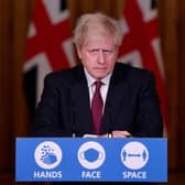 Boris Johnson used the catchy tagline to remind people of the importance of adhering to transmission-reducing tactics, but the phrase is out of touch with current government guidelines (Picture: Getty Images)