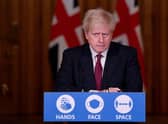 Boris Johnson used the catchy tagline to remind people of the importance of adhering to transmission-reducing tactics, but the phrase is out of touch with current government guidelines (Picture: Getty Images)
