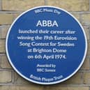 The new blue plaque marks the spot where Abba won the 19th Eurovision at Brighton Dome