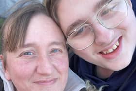 David Nottingham and his mum who has praised strangers for saving his life