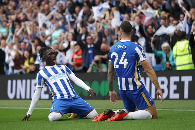 BRIGHTON, ENGLAND - AUGUST 21: Shane Duffy of Brighton and Hove Albion celebrates with teammate Yves Bissouma after scoring their side's first goal during the Premier League match between Brighton & Hove Albion  and  Watford at American Express Community Stadium on August 21, 2021 in Brighton, England. (Photo by Eddie Keogh/Getty Images)