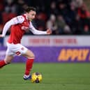Wrexham midfielder Ollie Rathbone has been injured in a pre-season friendly.