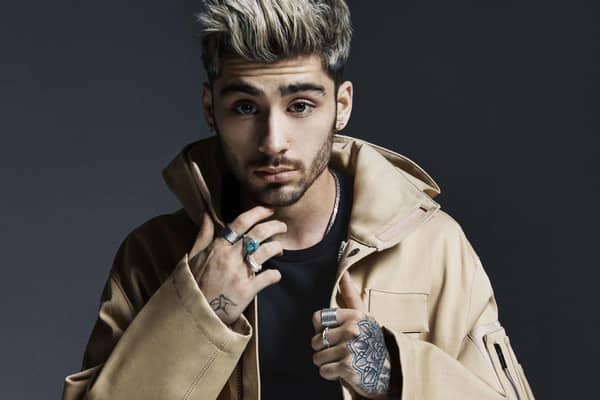 Singer Zayn Malik, who was part of boyband One Direction, has tried to use dating app Tinder to find love - but has been kicked off because users think he’s a catfish.