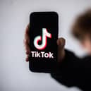 A third of teenagers have seen real-life violence on TikTok, new research suggests. (Picture: Loic Venance/AFP via Getty Images)