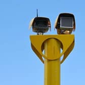 A pensioner has been arrested for cutting down a speed camera in Wigan