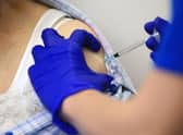 Mixing Covid vaccines can result in increased symptoms a study has suggested (Getty Images)
