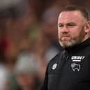DERBY, ENGLAND - APRIL 15: Wayne Rooney, Manager of Derby County looks on prior to the Sky Bet Championship match between Derby County and Fulham at Pride Park Stadium on April 15, 2022 in Derby, England. (Photo by Nathan Stirk/Getty Images)