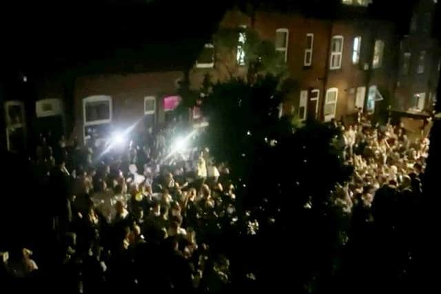 Hundreds of students having a street party near Hyde Park in Leeds (Photo: SWNS)