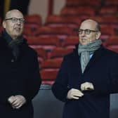Avram Glazer (L) and Joel Glazer, the Co-Chairmen of Manchester United.  (Photo by Michael Regan/Getty Images)
