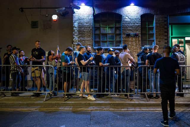 LONDON, ENGLAND - JULY 19: People queue to get in to the Egg London nightclub (Photo by Rob Pinney/Getty Images)