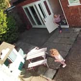 These cheeky toddler twins have been filmed outwitting their NHS scientist mum to avoid ending playtime - by running away every time she carries the other inside.